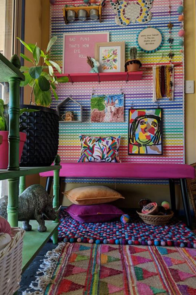 colorful room with bright colors, plants and bench