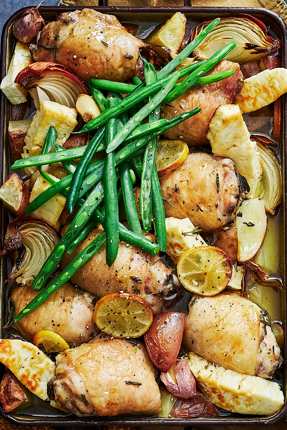 Roast chicken with potatoes and haloumi recipe Recipe | Better Homes ...